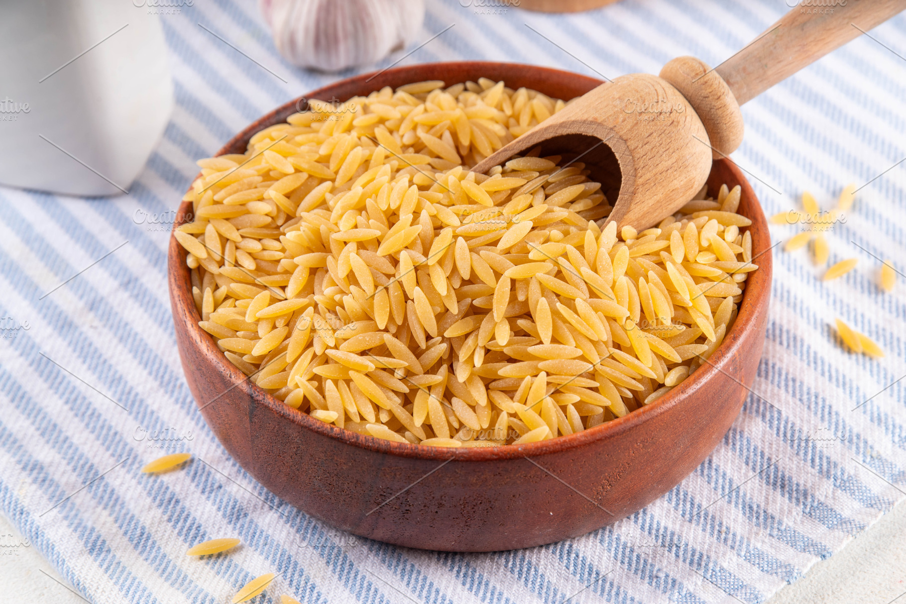 Raw uncooked orzo pasta, a Photo by Rimma