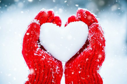Hands in mittens with heart, a Holiday Photo by MarBom