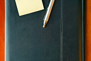 Executive Folder with note and pen, a Business Photo by THP Creative