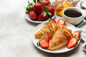 Delicious french breakfast with coffee, honey and croissants acc, a Food & Drink Photo by Olena Rudo