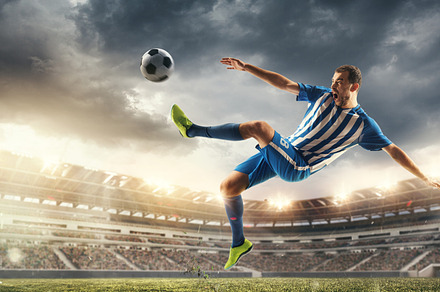 Male football or soccer player at stadium - motion, action, activity concept, a Sports & Recreation Photo by Volodymyr Melnyk