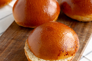 Homemade Brioche Buns Ready to Eat, side view., a Food & Drink Photo by LiudmylaChuhunova