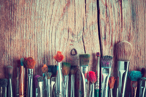 Row of artist paint brushes