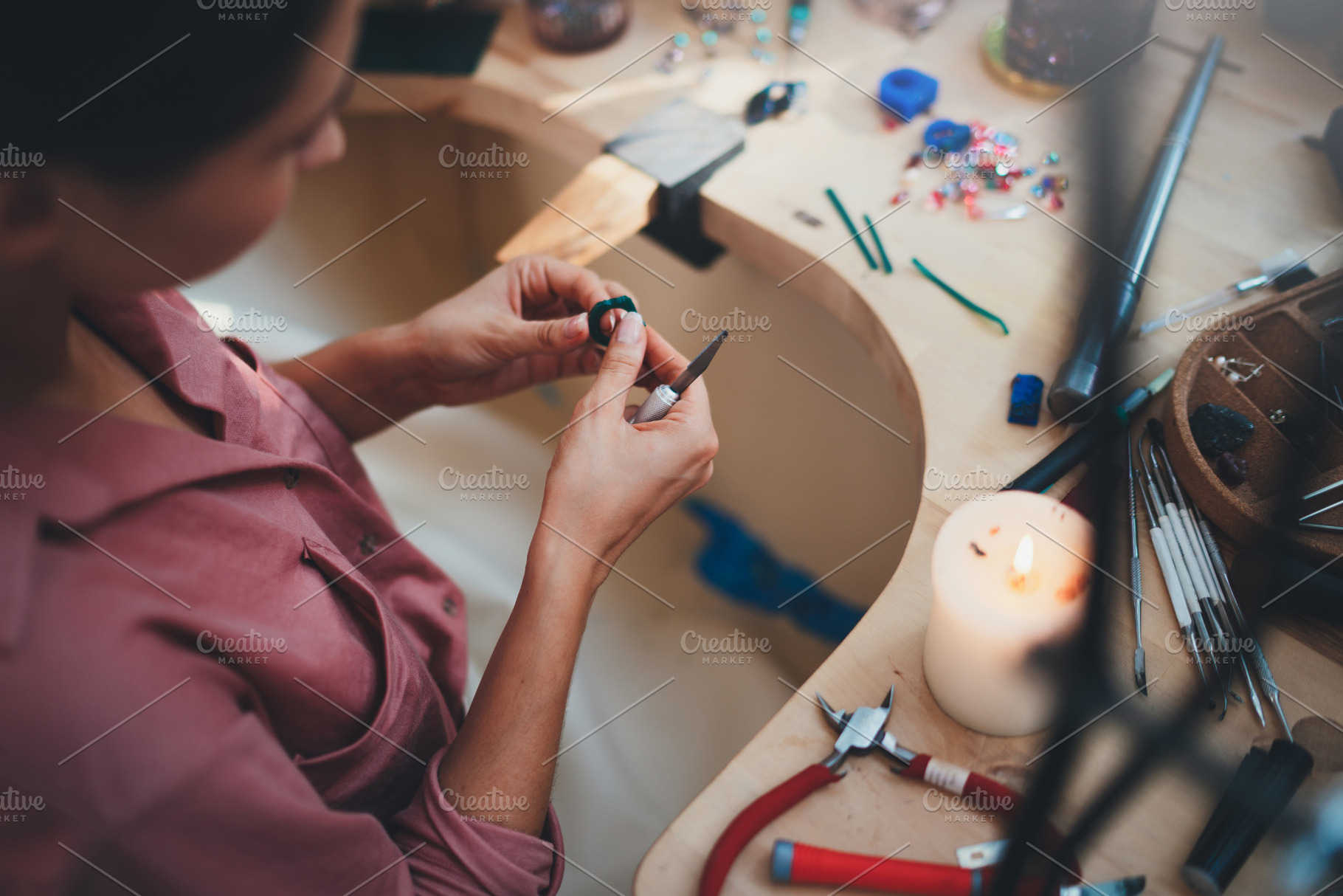 Young jeweler designer at workshop stock photo containing accessories and, a Person Photo by ImYanis