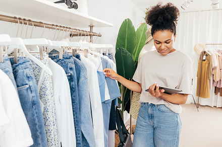 Female entrepreneur in a boutique, a Beauty & Fashion Photo by Artem Varnitsin