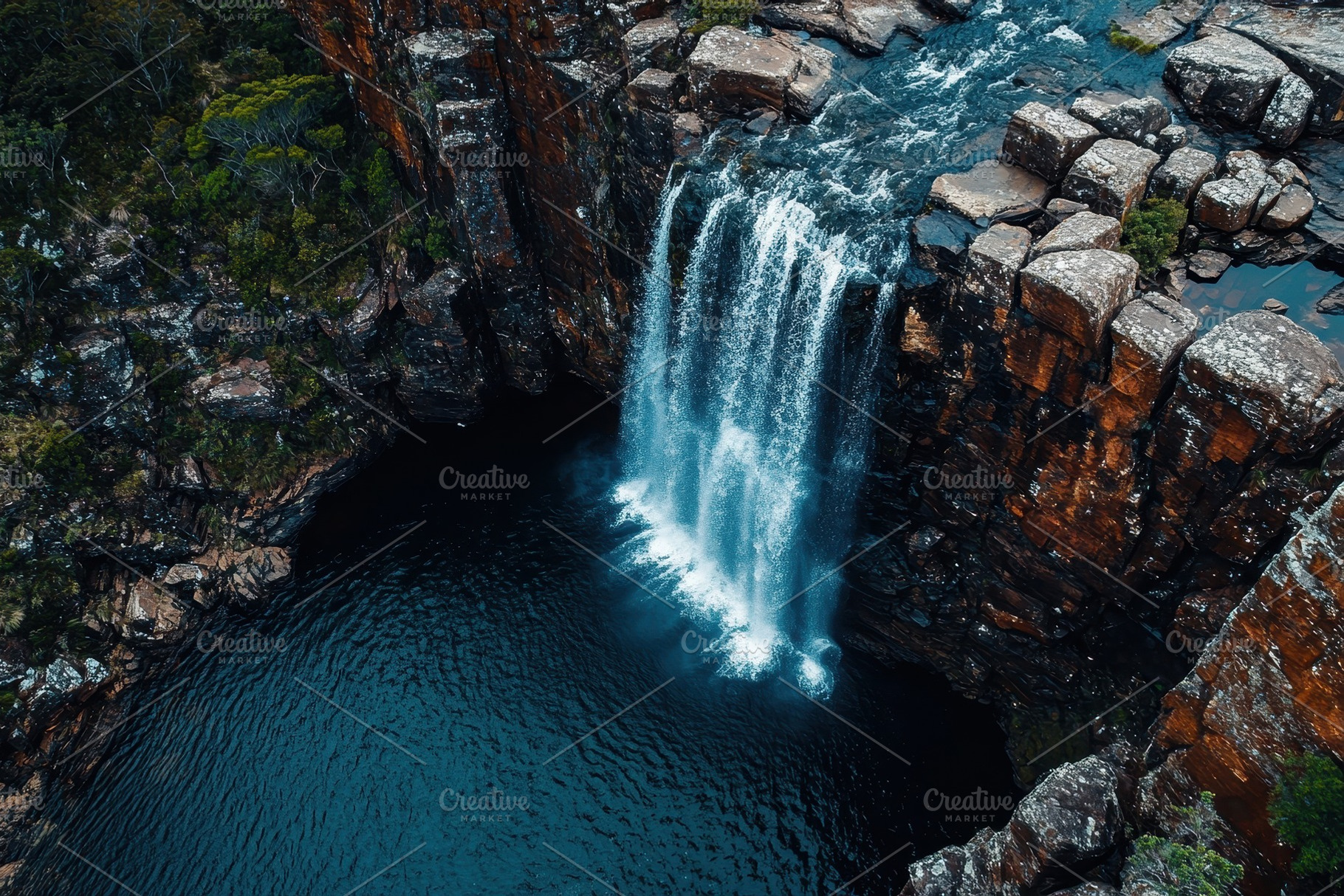 Majestic waterfall cascading into de, a Photo by Iftikhar Alam