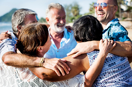 Group of seniors on the beach featuring adult, arms, and arms around, a Holiday Photo by rawpixel