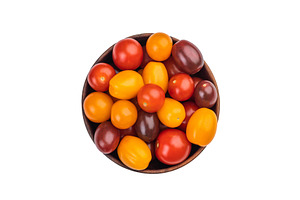 Colorful mix of heirloom cherry tomatoes in a wooden bowl shot o, a Food & Drink Photo by composter-box@mail.ru