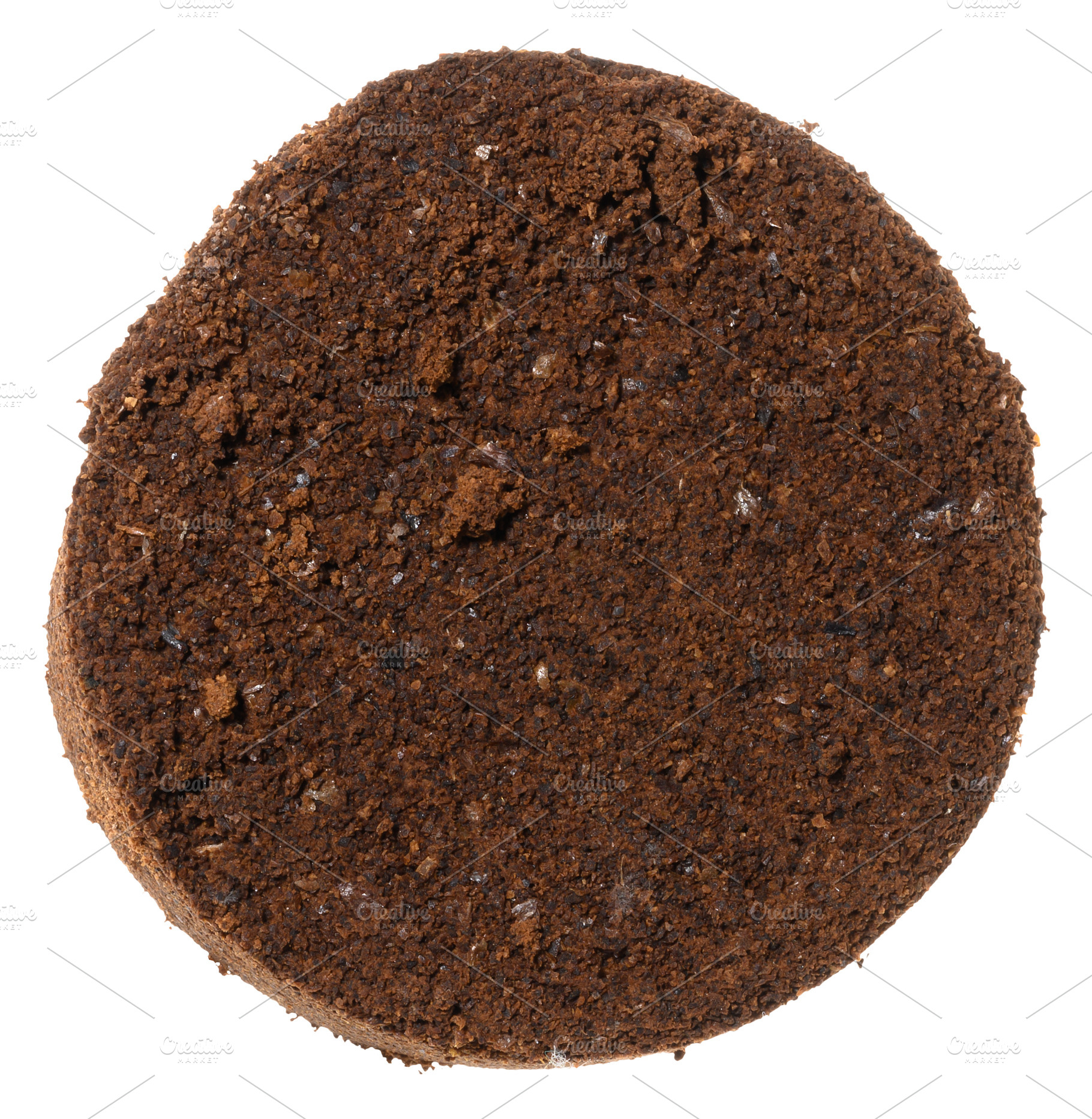 Pressed tablet of used ground coffee, coffee puck or cake, top v, a Food & Drink Photo by ndanko