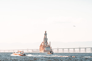 Speedboats Pass Offshore Drillship, a Sports & Recreation Photo by SkyNext