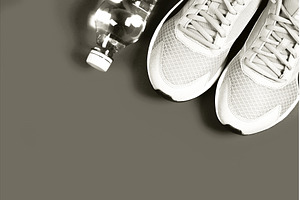 Running shoes and water bottle for, a Sports & Recreation Photo by Anna Efetova