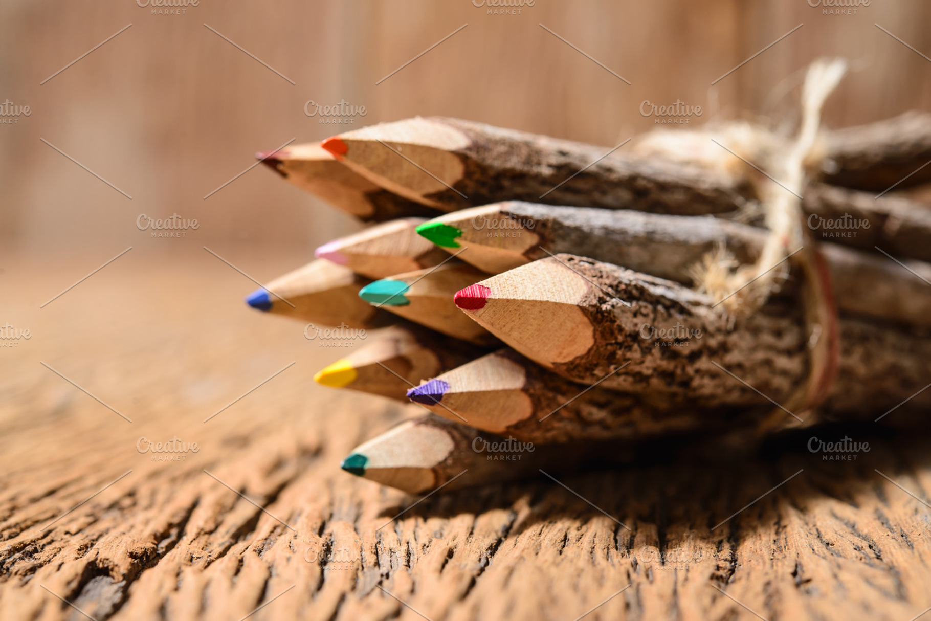 color pencil made of branches, a Background Photo by Looker_Studio