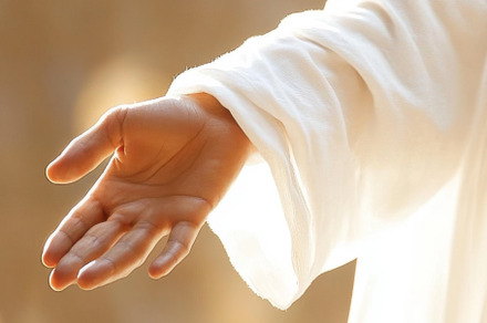 Hand of Jesus reaching out with light in spiritual scene, copy s, a Photo by Dvoevnore photos