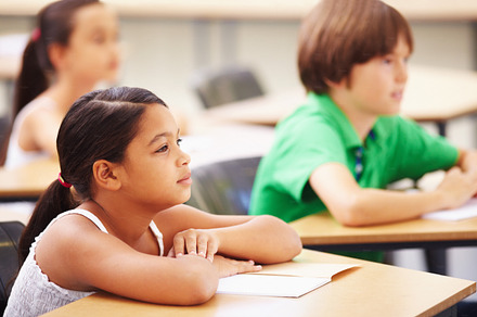 Hanging onto their teacher's words, a Photo by Peopleimages.com