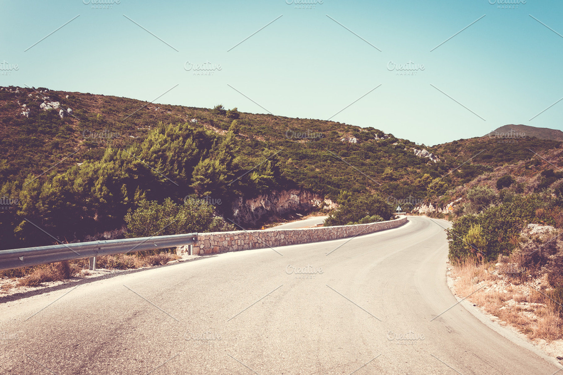 Mountain road featuring road, mountain, and landscape, a Nature Photo by Juicy Photography