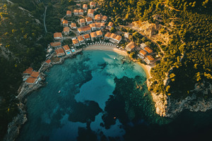 Idyllic resort town in Greece with s, a Photo by Iftikhar Alam