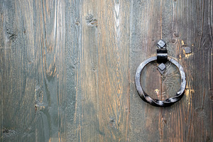Door handle in the shape of a ring, an Architecture Photo by Schreibikus