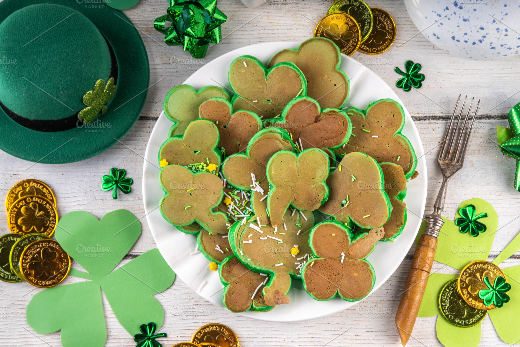 Shamrock shaped green tasty sweet pancakes for St Patricks day b, a Food & Drink Photo by Rimma