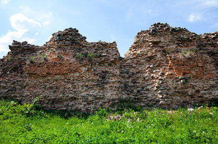 Ruins of an ancient fortress made of red bricks and stones, a Photo by MyPhotos