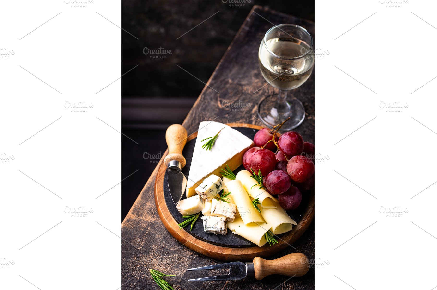 Different types of cheese, wine and, a Food & Drink Photo by Yulia Furman