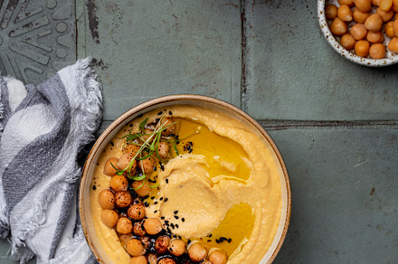 Traditional homemade chickpea hummus, a Food & Drink Photo by Marina_Pronina