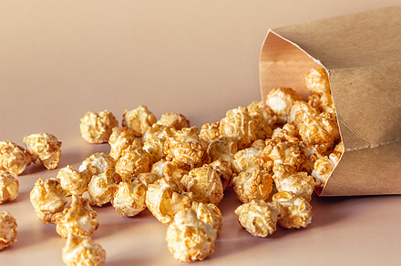sweet popcorn in paper packaging, a Food & Drink Photo by itakdalee