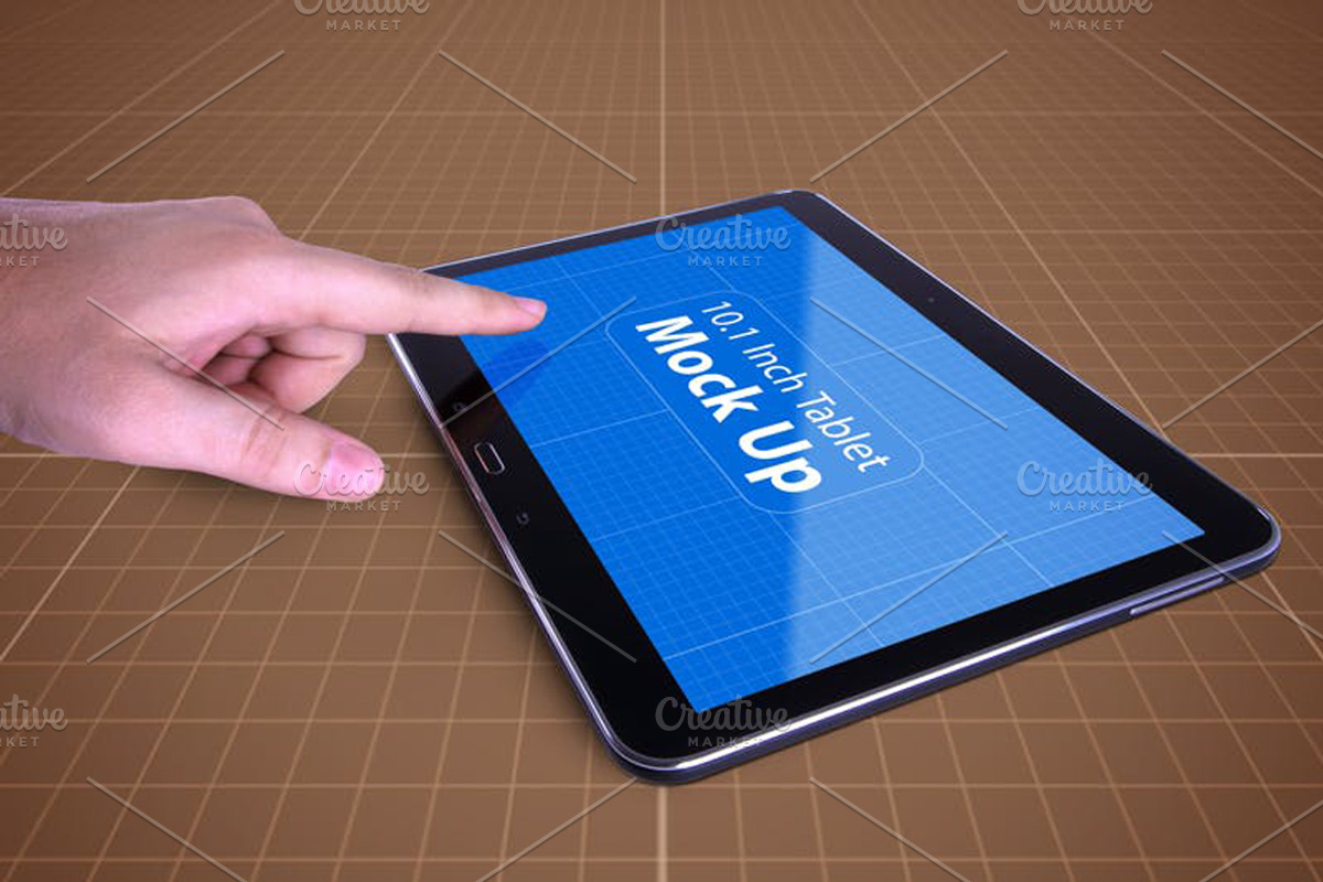 Tablet in Hand Mock Up, an iPad Mockup by Qaleb Studio (Photo 8 of 11)
