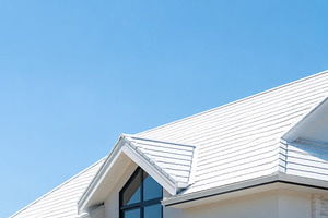 White house roof against blue summer, a Photo by Dvoevnore photos