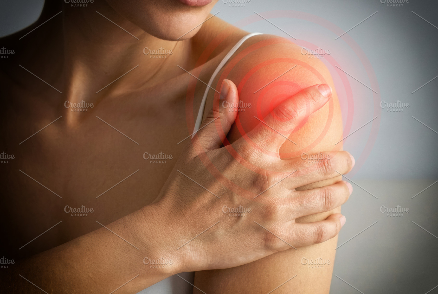 Shoulder Pain Highlighted in Young Woman, a Health & Medical Photo by Davizro's Market