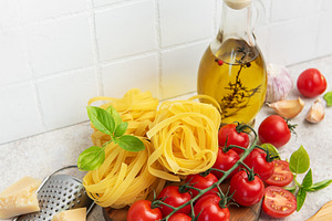 Italian pasta ingredients preparing a fresh meal, a Food & Drink Photo by Olena Rudo
