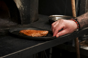 Oven cooking meal preparation chef pan steak meat, a Person Photo by Photo Drive Studio