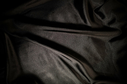 Shiny black satin fabric featuring background, fabric, and black, an Abstract Photo by Deyan Georgiev