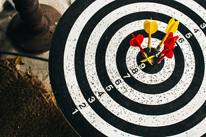 Target containing target, aim, and butt