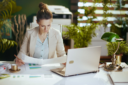 pensive 40 years old business owner woman in green office, a Person Photo by Alliance Images