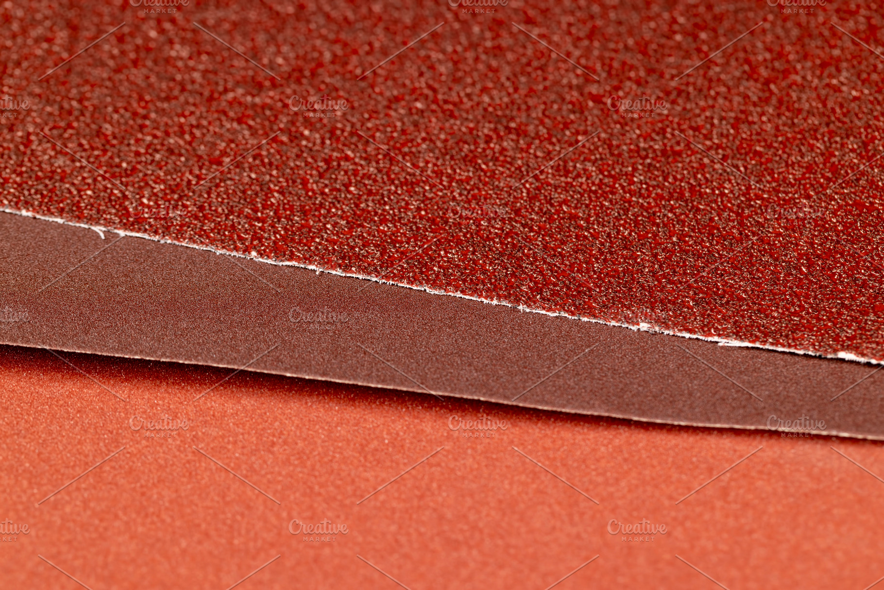 different sandpaper for coarse or fine processing of materials, a Photo by rsoollAI