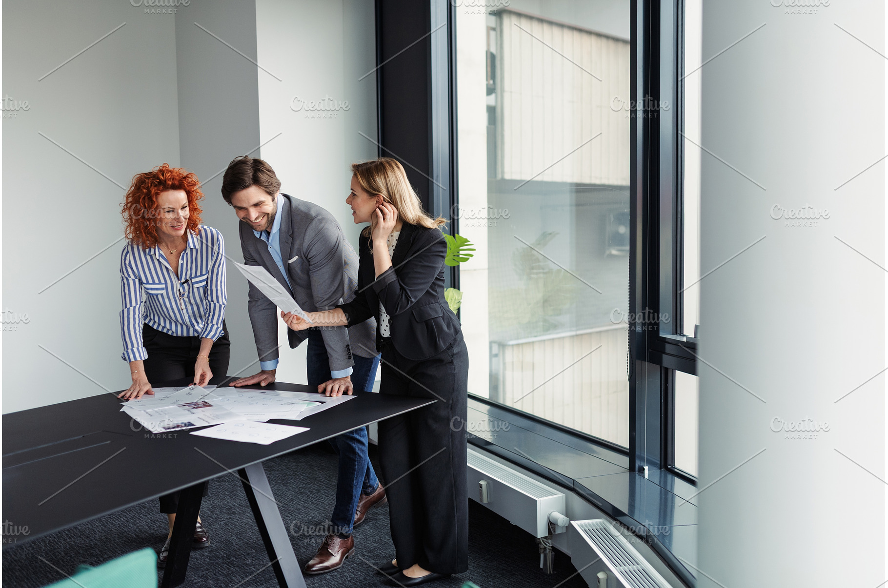 Creative team having discussion over, a Business Photo by HalfPoint