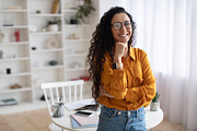 Happy Middle Eastern Female Posing Smiling To Camera Standing Indoor, a Photo by Prostock-Studio (Thumbnail 2 of 2)