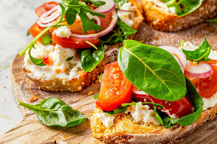 Slice of bread cheese and tomato, a Food & Drink Photo by AS Studio