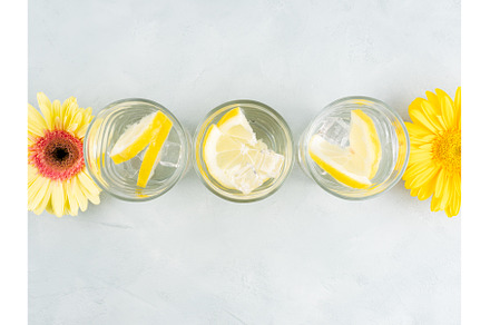 Lemon water drink with ice cubes on, a Food & Drink Photo by Lifemorning