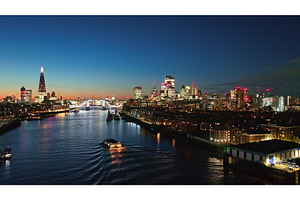London skyline reflecting on River, an Architecture Photo by Goinyk