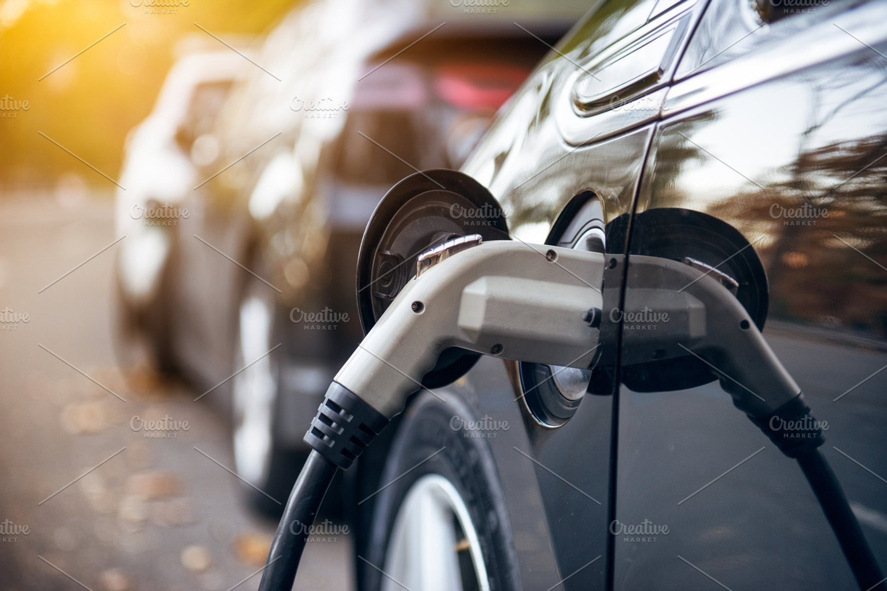Electric car charging on parking, a Transportation Photo by New York Art Store