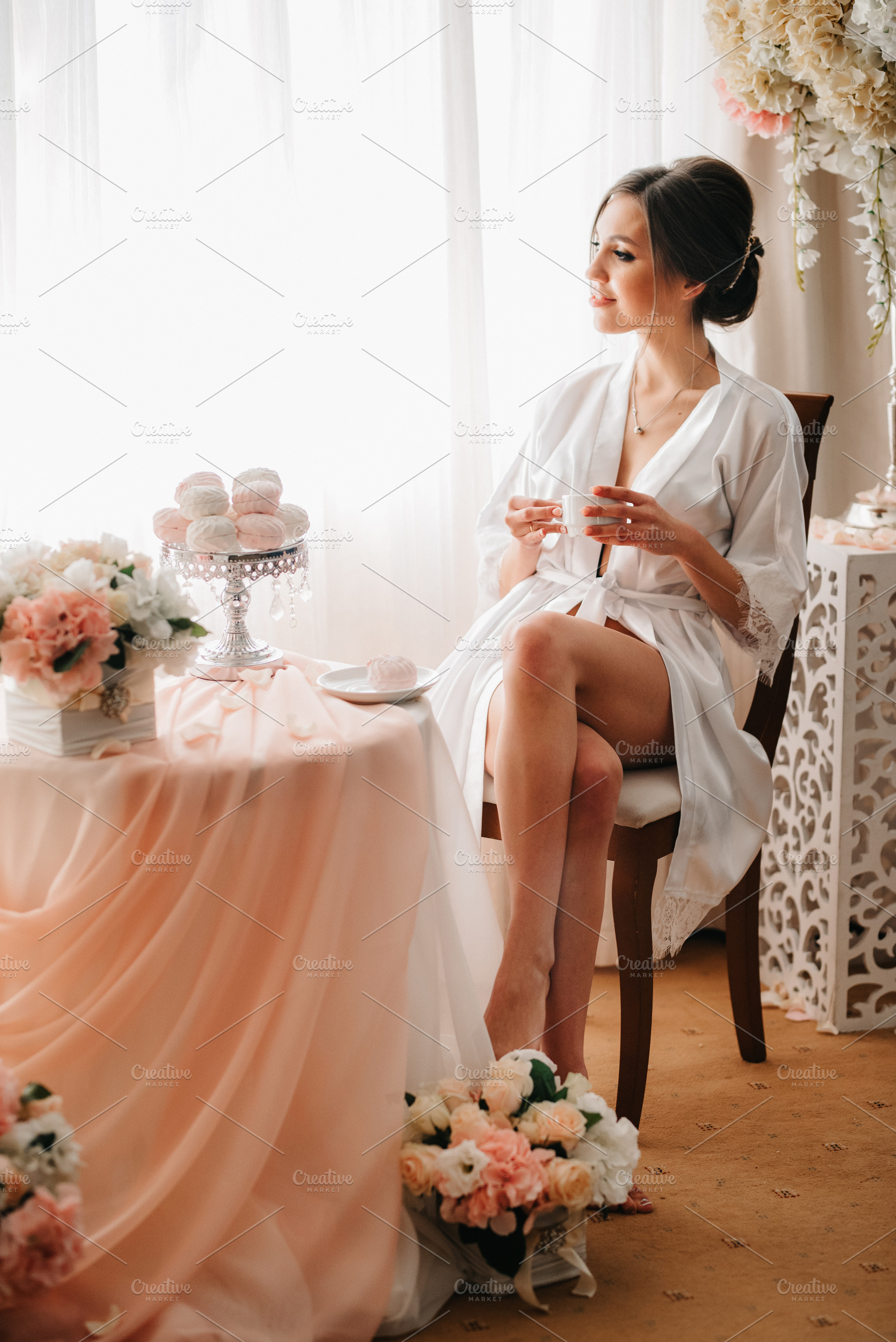 A young bride sits at a slot machine in the morning and drinks c, a Person Photo by Weddings, People, Travel