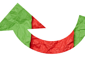 Two-color curved arrow, crumpled green and red paper, change and, an Abstract Photo by ndanko