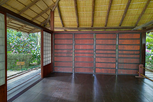 Japanese-style pavilion with open wooden floor, botanic garden,, a Nature Photo by DanFLCreativo