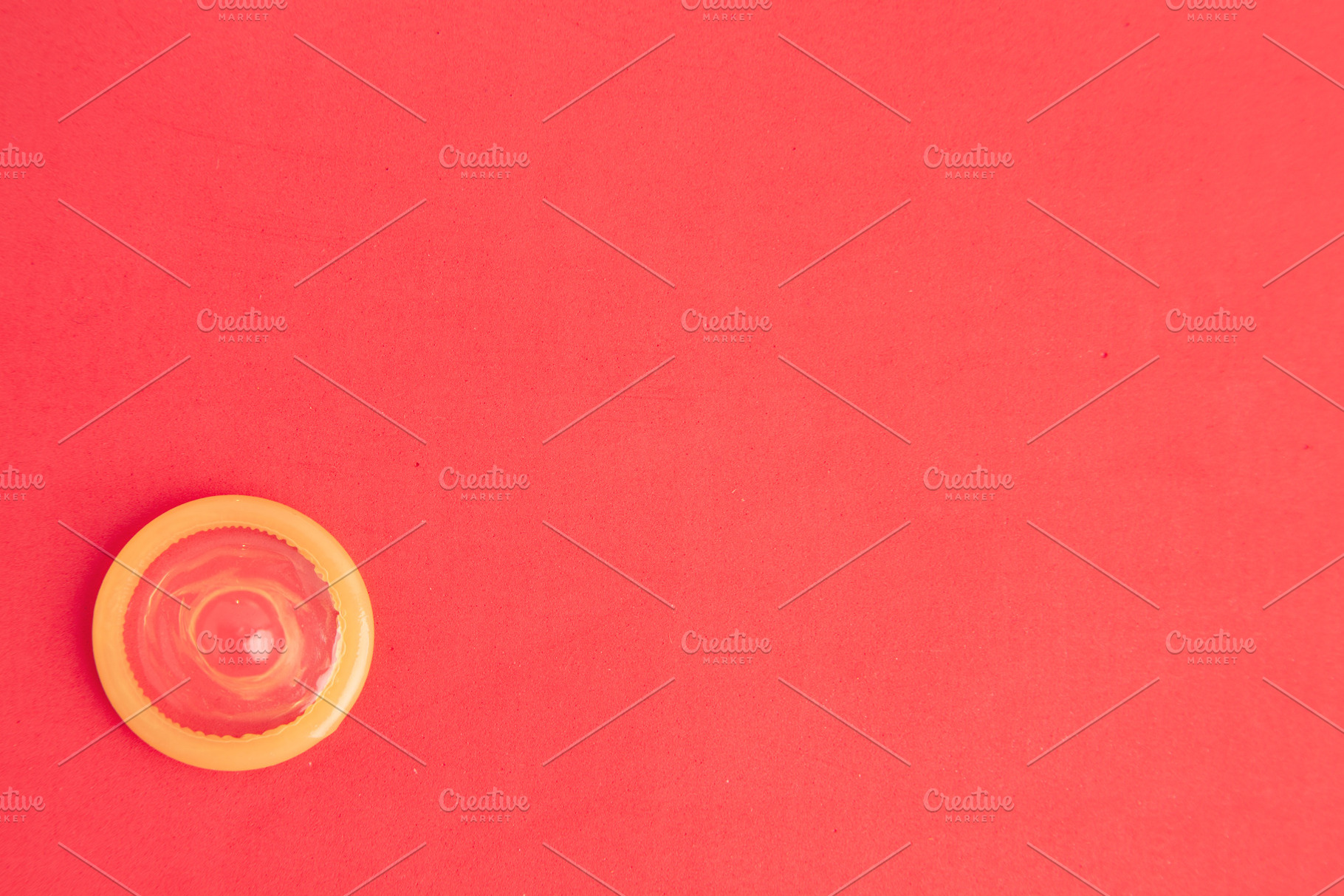 condom in colorful background, a Background Photo by robcar