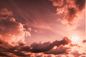 Dramatic Pink Clouds and Sun in, a Nature Photo by Our Amazing World