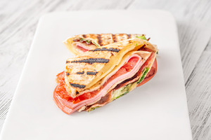 Folded tortilla wrap with cheese bac, a Food & Drink Photo by Alexander Prokopenko