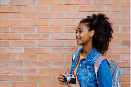 Multiracial teenage girl with, a Sports & Recreation Photo by HalfPoint
