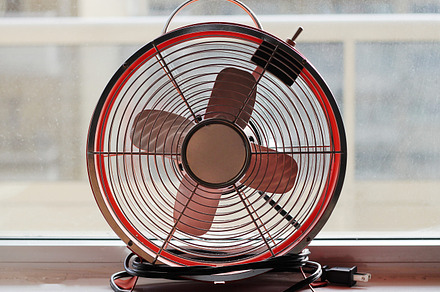 Vintage fan on a window sill
