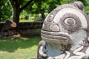 Stone tiki statue in Atuona, Hiva Oa, Marquesas Islands, French, an Arts & Entertainment Photo by GoodGoods